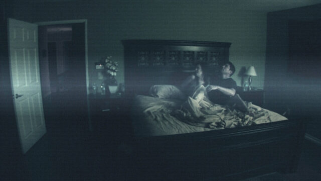 Kate Featherston and Micha Sloat in a scene from Paranormal Activity.